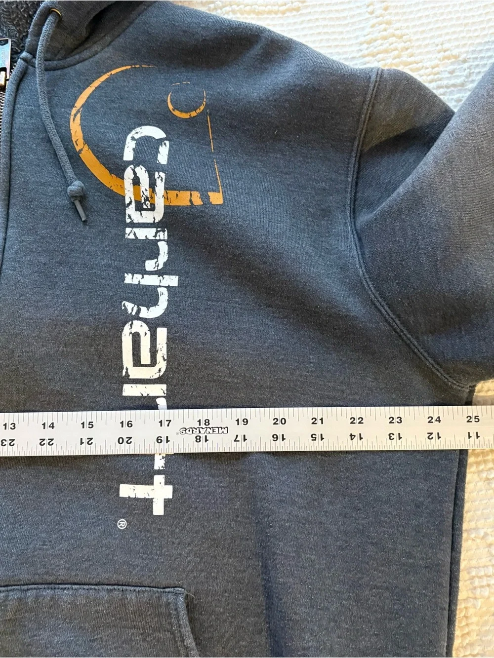Carhartt Y2K Charcoal Gray Zip-Up Hoodie with Vertical Logo and Orange Accent.